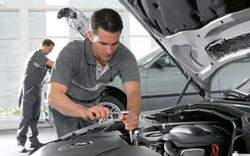 Repairing a car engine, Minsk